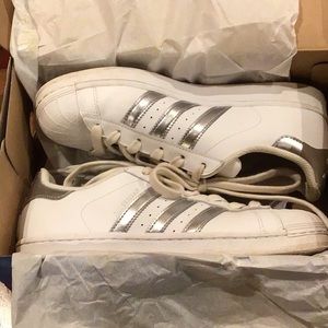Adidas Superstar tennis shoes. Silver and white.